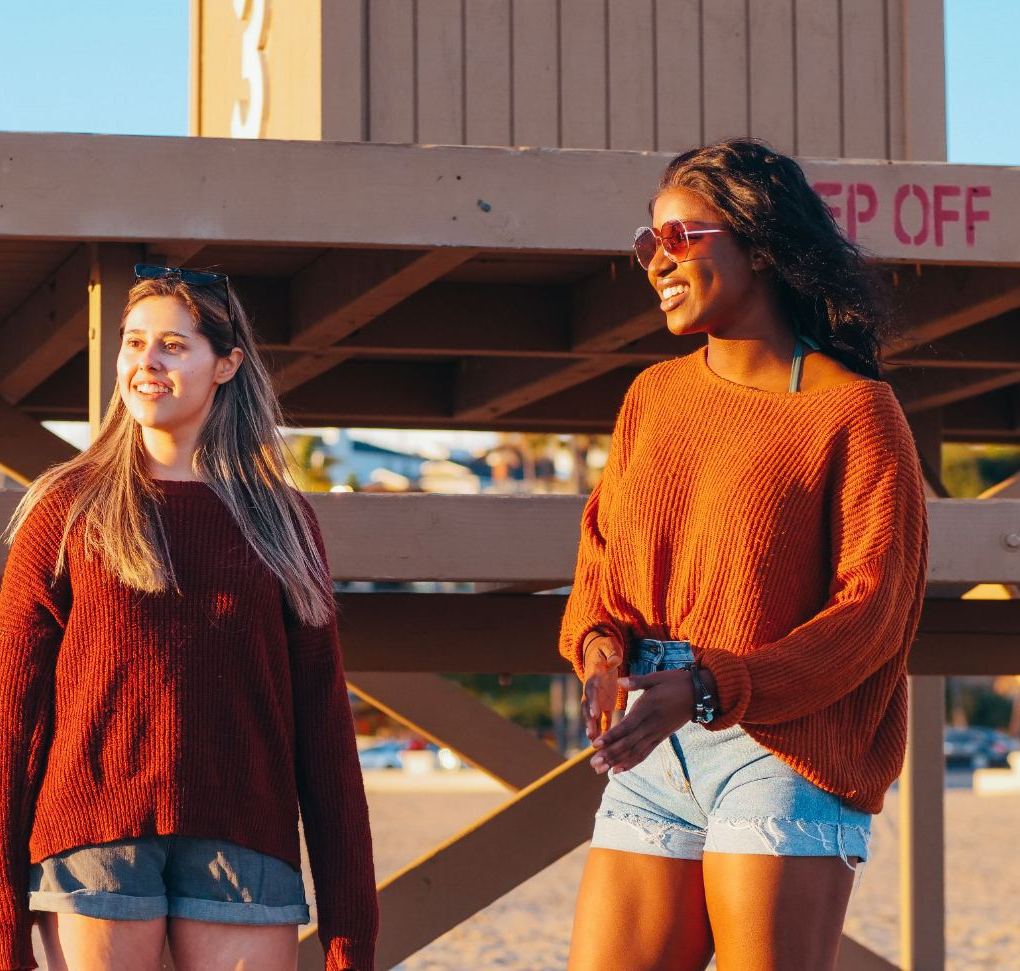 Two Twine caregivers at golden hour